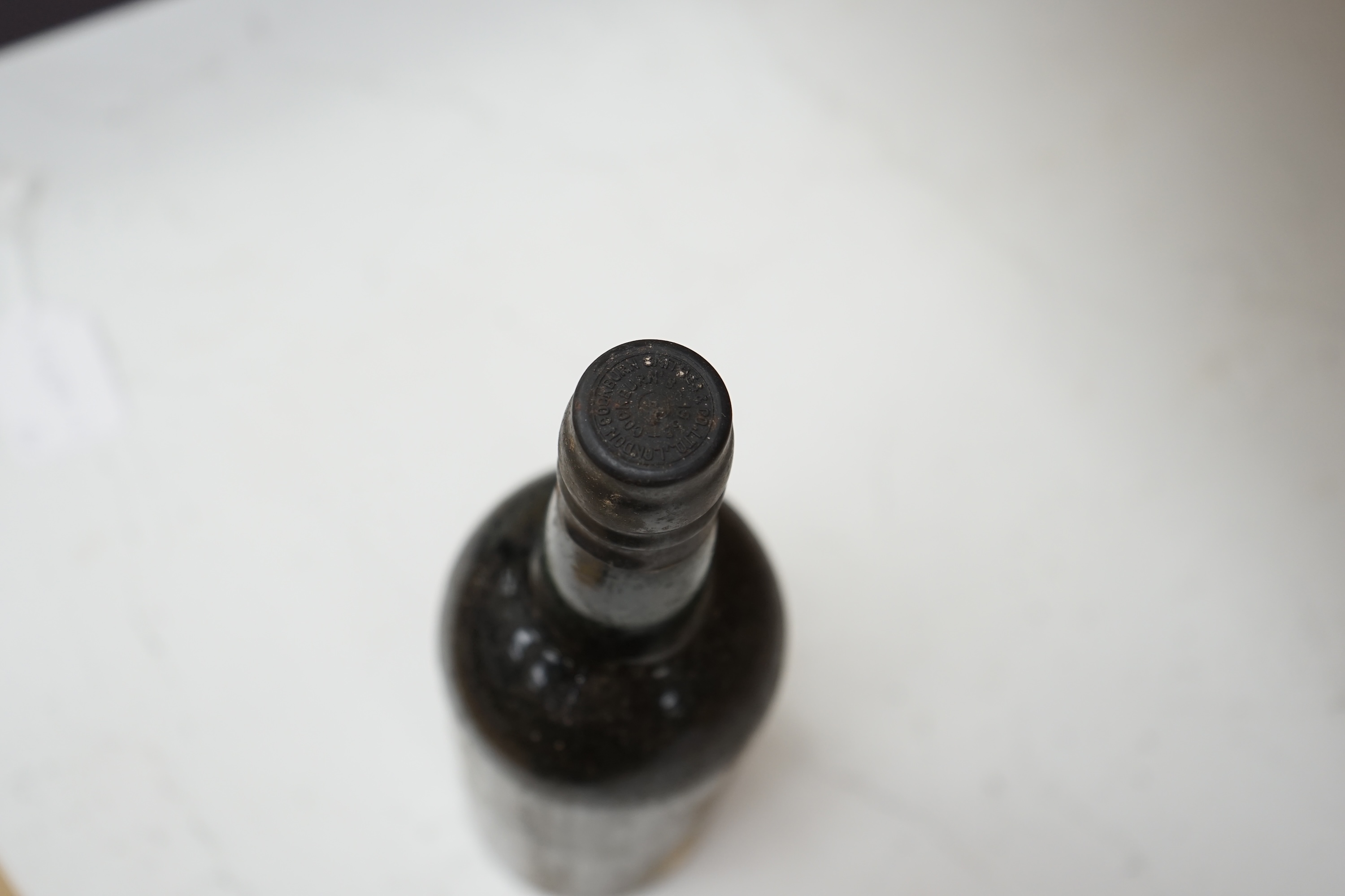 Four bottles of Cockburn’s 1963 vintage port. Condition fair, some wear to labels.